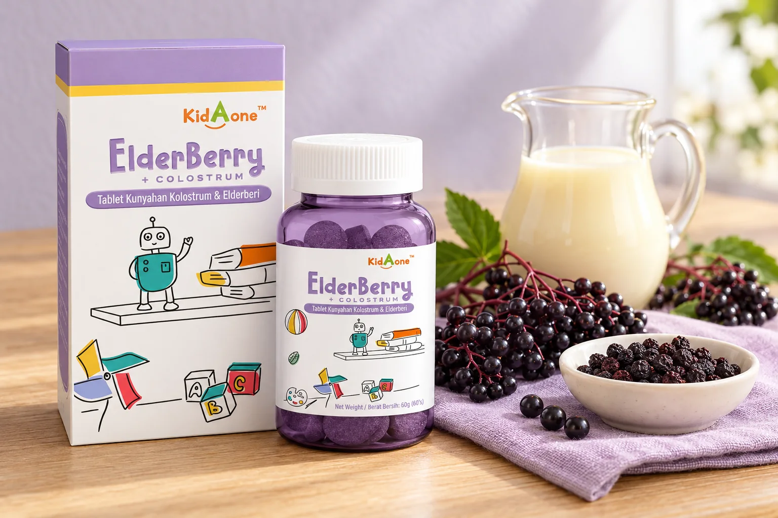 The KidAOne ElderBerry + Colostrum box and bottle with black elderberries and a small jug of milk