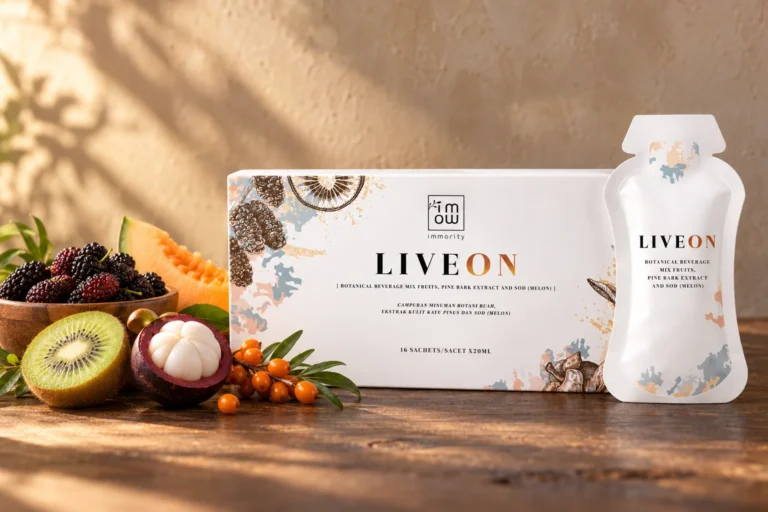 The LIVEON box and a sachet beside mulberries, kiwi, mangosteen, melon and sea buckthorn berries