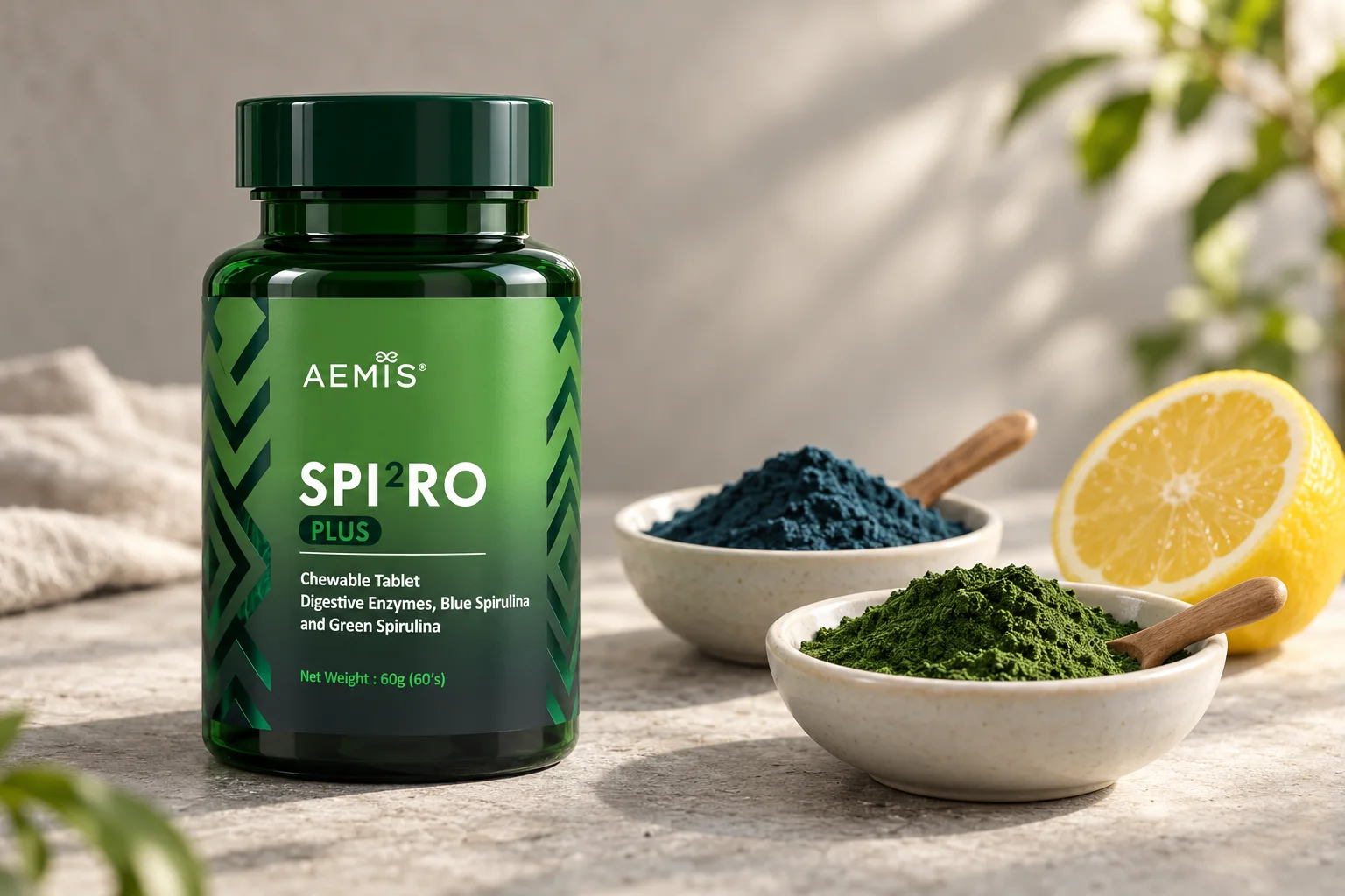 The SPIRO Plus bottle beside two bowls of spirulina and chlorella powder and a halved lemon