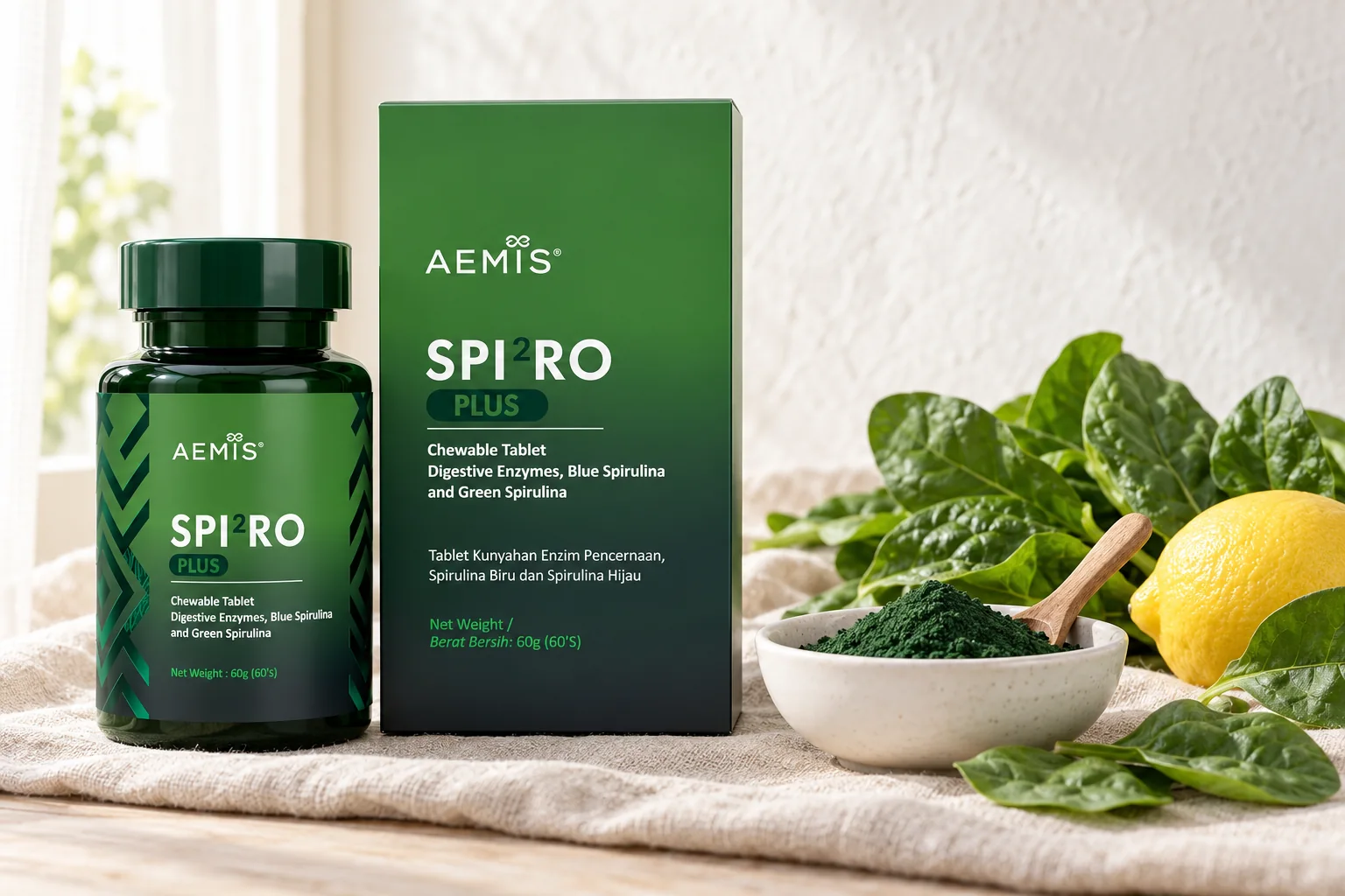 The SPIRO Plus bottle and box beside chlorella powder, spinach leaves and a lemon