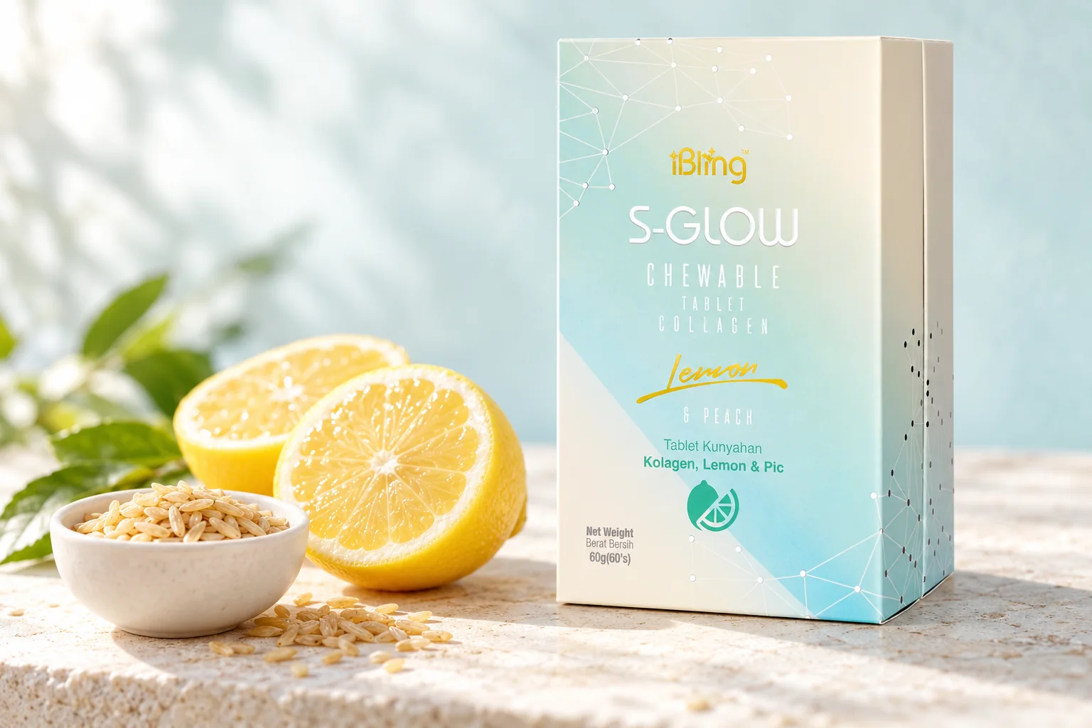 The iBling S-GLOW box beside halved fresh lemons and a small bowl of rice germ