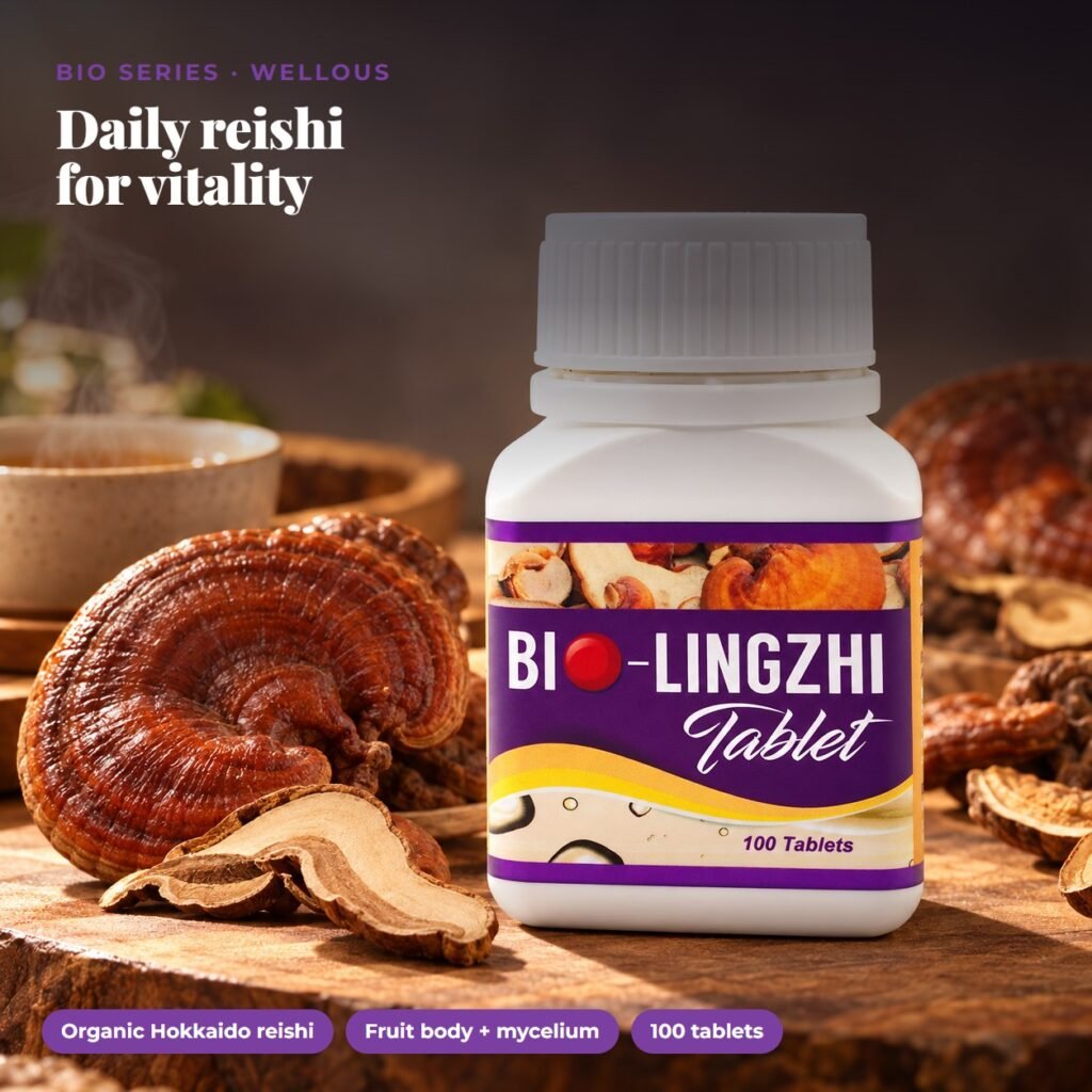BIO LingZhi bottle with whole red reishi mushrooms on a wooden board