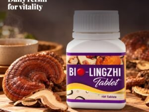 BIO LingZhi bottle with whole red reishi mushrooms on a wooden board