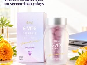 E-VITE eye care chewable on a bright desk with marigold flowers
