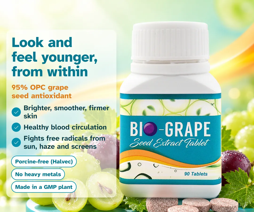 BIO-GRAPE Seed Extract Tablet on a teal stand with fresh grapes. Look and feel younger, from within: 95% OPC grape seed antioxidant for brighter, smoother, firmer skin, healthy blood circulation, and to fight free radicals from sun, haze and screens. Porcine-free (Halvec), no heavy metals, made in a GMP plant.