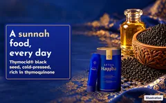 Illustration: black seeds in a carved bowl and a bottle of black seed oil on a blue songket cloth beside the Hayyiba tin. A sunnah food, every day. Thymocid black seed, cold-pressed, rich in thymoquinone.