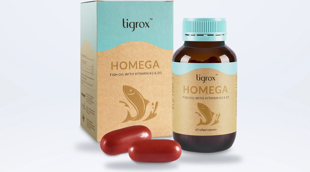 TIGROX HOMEGA box and bottle with two red softgels: fish oil with vitamins K2 and D3, 60 softgel capsules.