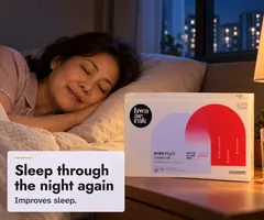 A woman in her fifties sleeping soundly at night, the Hwa Ae Rak Turning Me box on her nightstand: sleep through the night again.