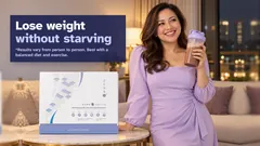 A confident woman in a lavender dress smiling with her chocolate Kuro Daitto shake, the Kuro Daitto box on the side table. Lose weight without starving. Results vary from person to person. Best with a balanced diet and exercise.