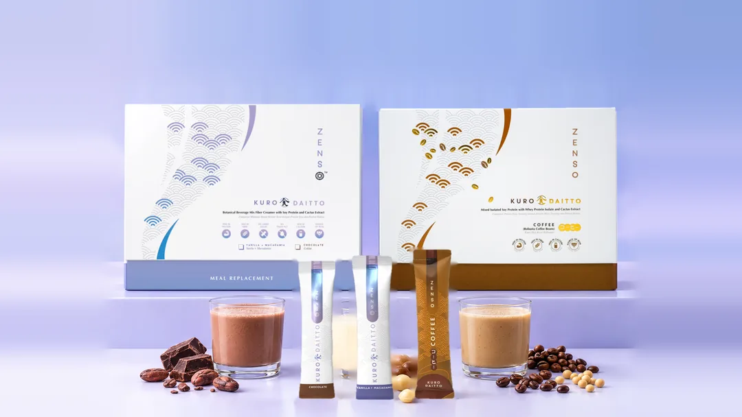 Both Kuro Daitto boxes with a stick sachet of each flavour, Chocolate, Vanilla Macadamia and Coffee, and a shake of each.