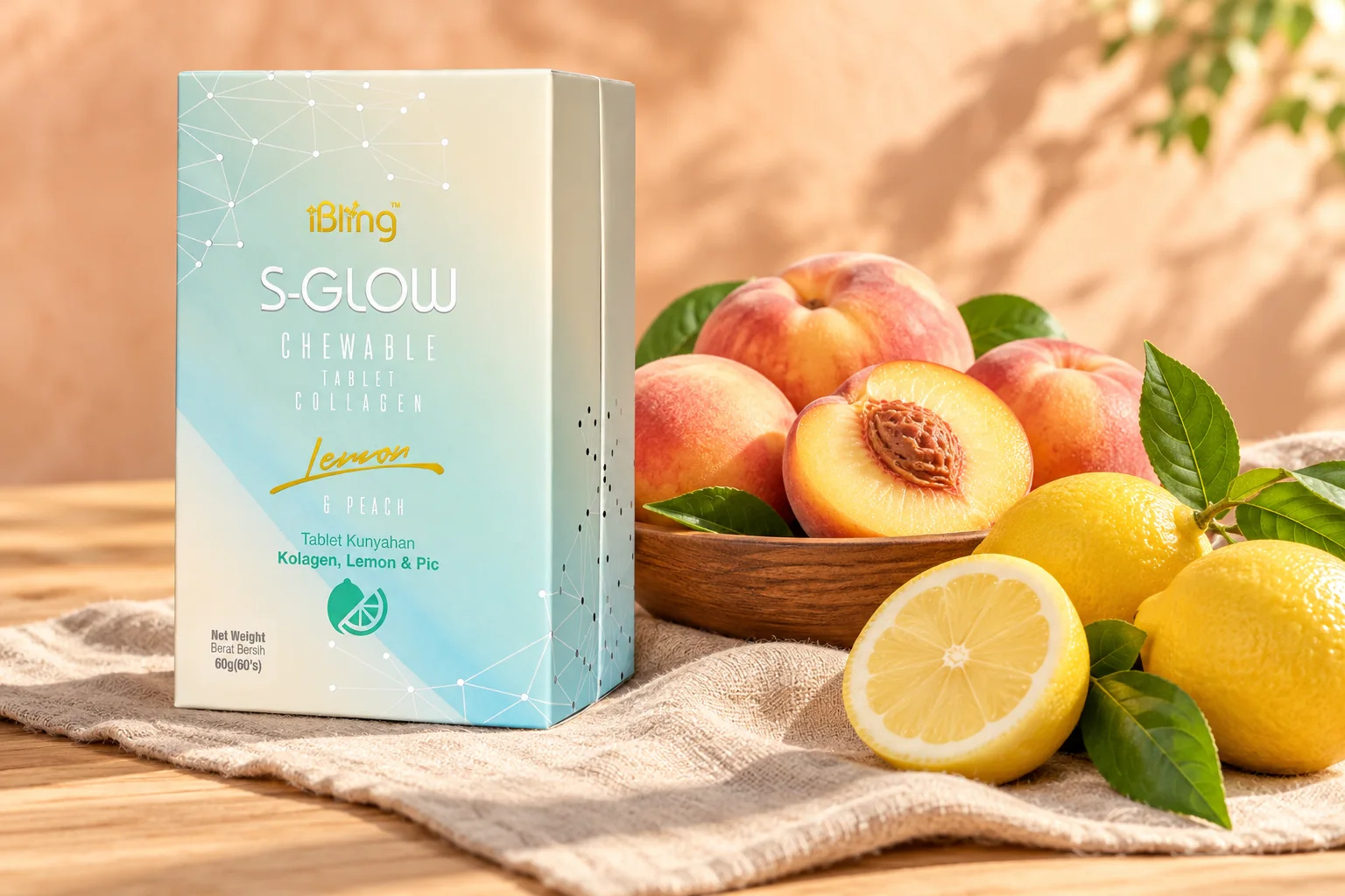 The S-GLOW box with ripe peaches, lemons and lemon leaves on linen