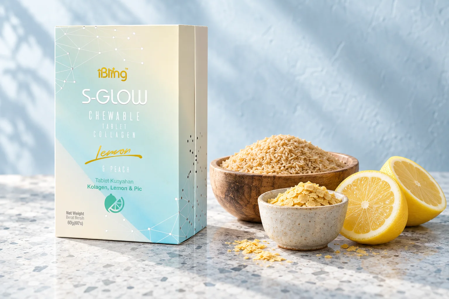 The S-GLOW box beside a wooden bowl of rice germ, a cup of nutritional yeast and halved lemons